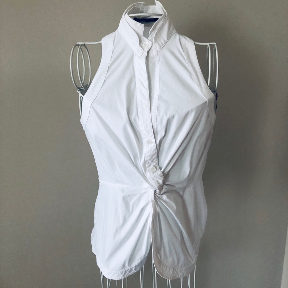 BCBG sleeveless high collar blouse.
